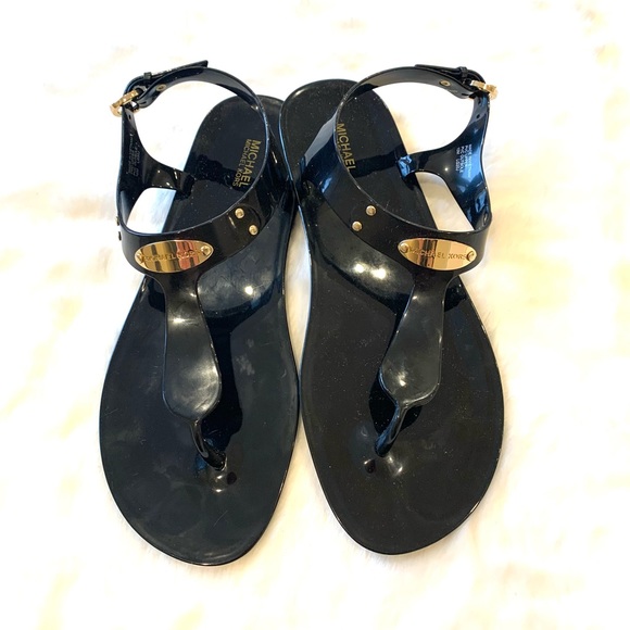 Black and gold Michael Kors thong sandals. - Picture 2 of 5